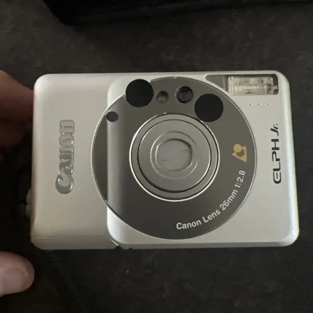 Canon Elph Jr Handheld Built-in Flash 26mm APS Film Camera With Battery Included